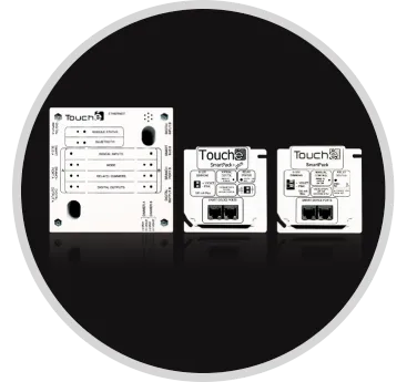 Three white distributed controller products with black text on them